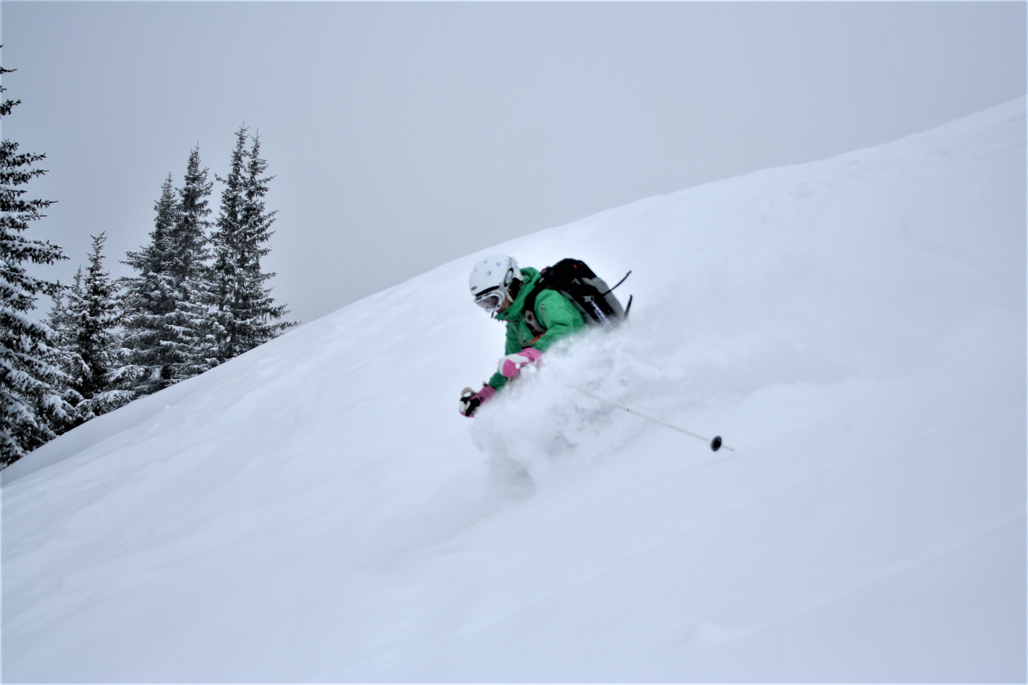 off-piste skier in powder snow